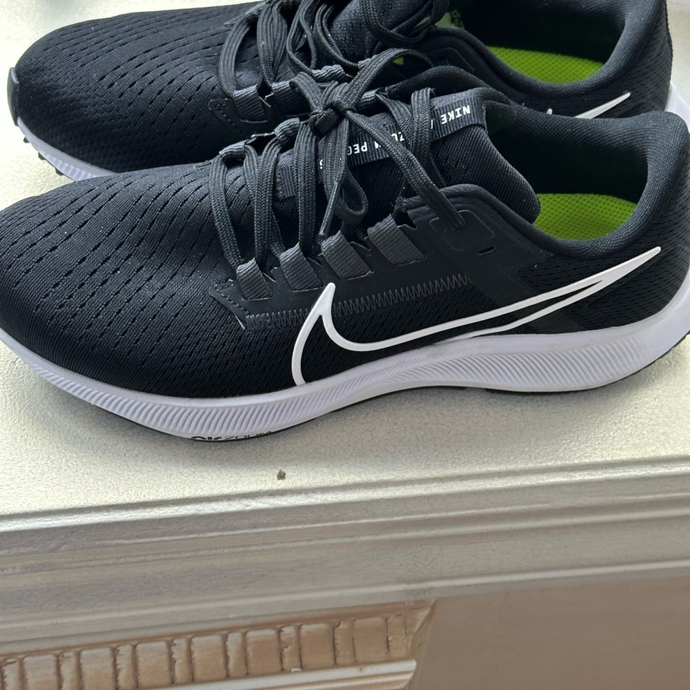 Nike Black and White Sneakers with Sleek Design